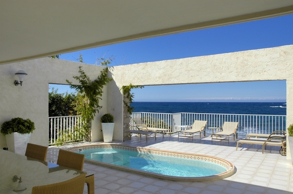 Swimming pool from with the amazing viw from the Villa Cala Rossa Swimming pool from with the amazing viw from the Villa Cala Rossa